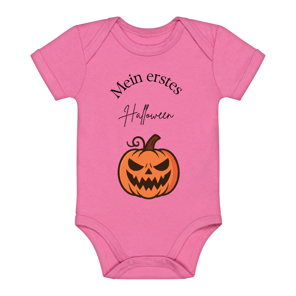 Baby Body Mein erstes Halloween mit einem Kürbis in orange abgebildet: Farbe des Bodys pink  und  Aufdruck der Schrift in schwarz