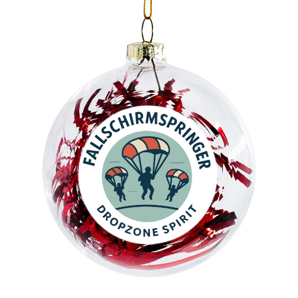 Fallschirmspringer Weihnachtskugel  mit drei abgebildeten Fallschirmspringer und roten Folienstreifen in der Kugel