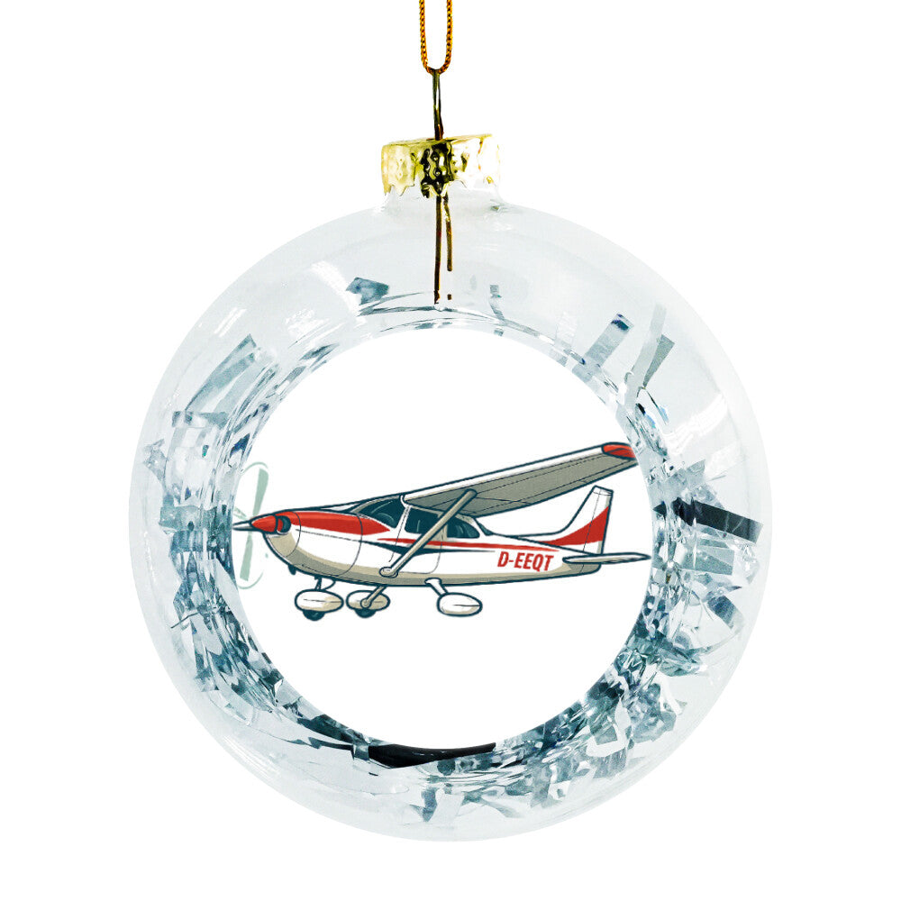 Weihnachtskugel Motorflugzeug auf dem Motorflugzeug erkennt man die Kennung D-EEQT in der Kugel sind Folienstreifen in der Farbe Silber